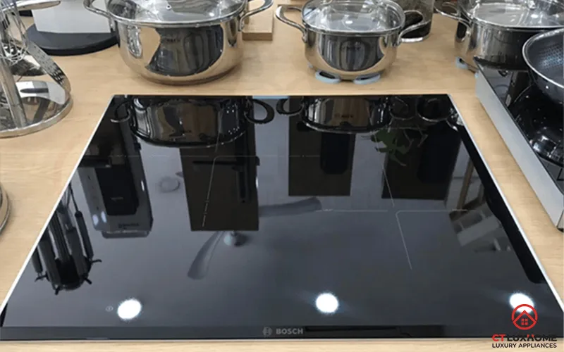 Kiểm tra bếp từ Bosch có kén nồi không với các dụng cụ thực tế