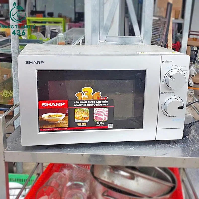 Lò vi sóng Sharp thanh lý mẫu 1 - điều khiển núm xoay cơ, lòng thép không gỉ