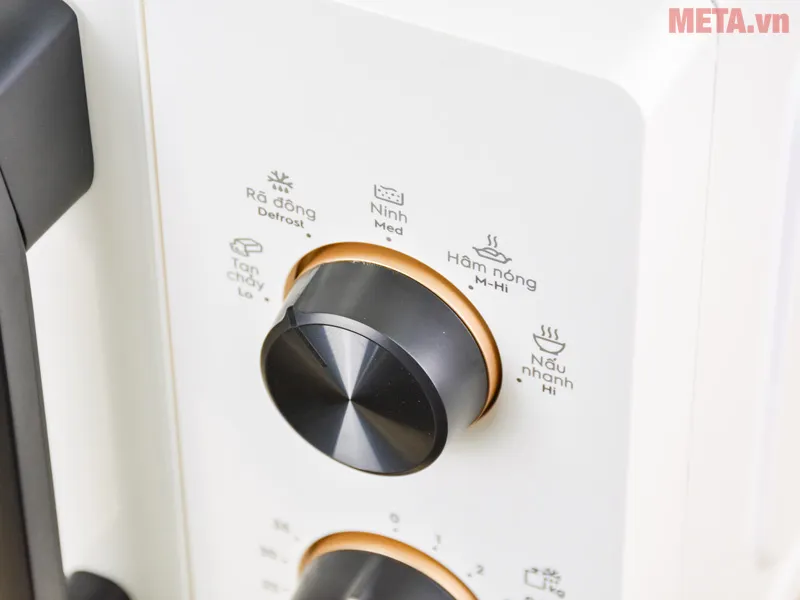 Vặn nút chọn chế độ đến chế độ mà bạn muốn sử dụng trên máy cơ