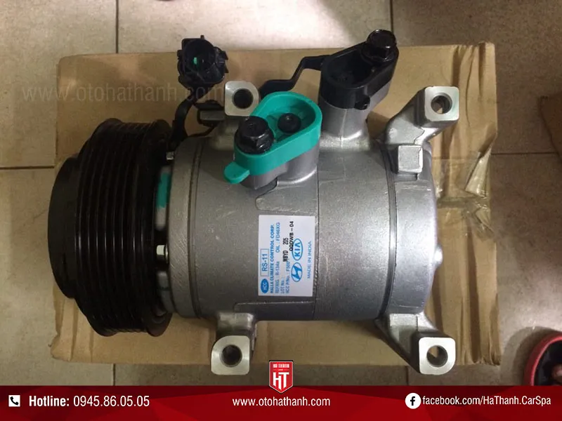 Cận cảnh cụm block máy lạnh ô tô sau khi được bảo dưỡng và làm sạch mặt bích