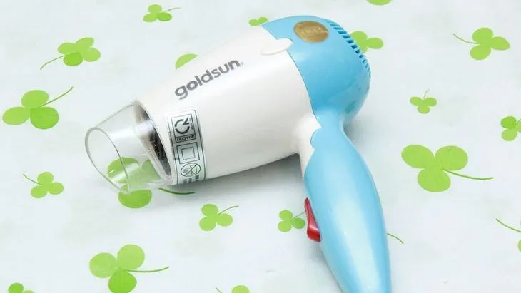 Máy sấy tóc Goldsun thiết kế cầm tay nhỏ gọn