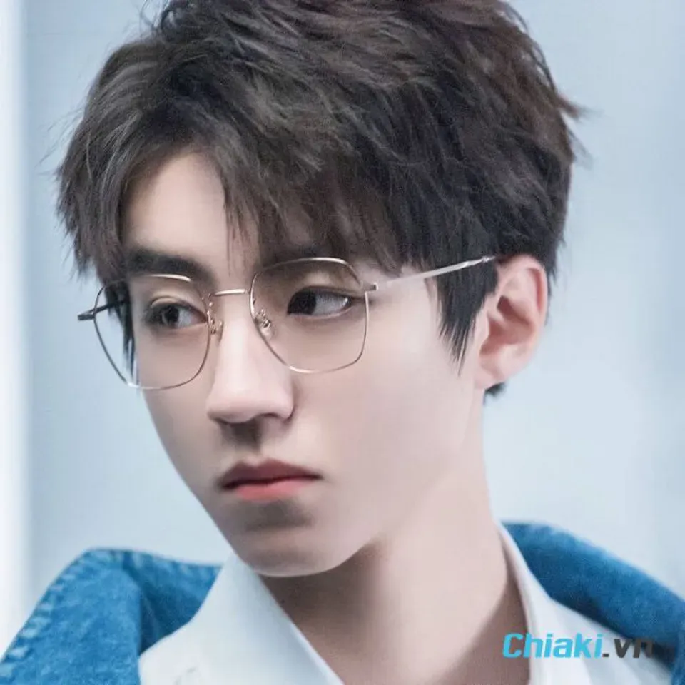 Hình ảnh kiểu Tóc layer nam mặt trái xoan