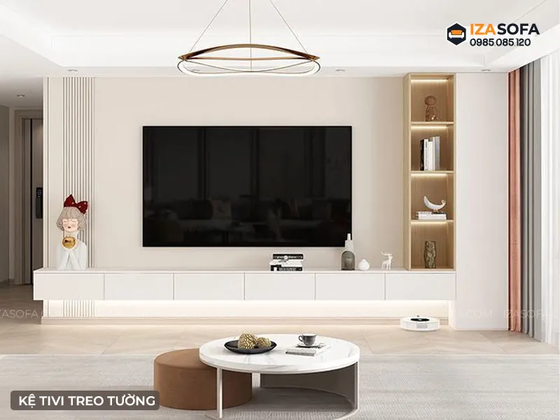 Hệ thống tủ phòng khách kèm kệ tivi treo tạo nên không gian lưu trữ rộng rãi và đồng bộ