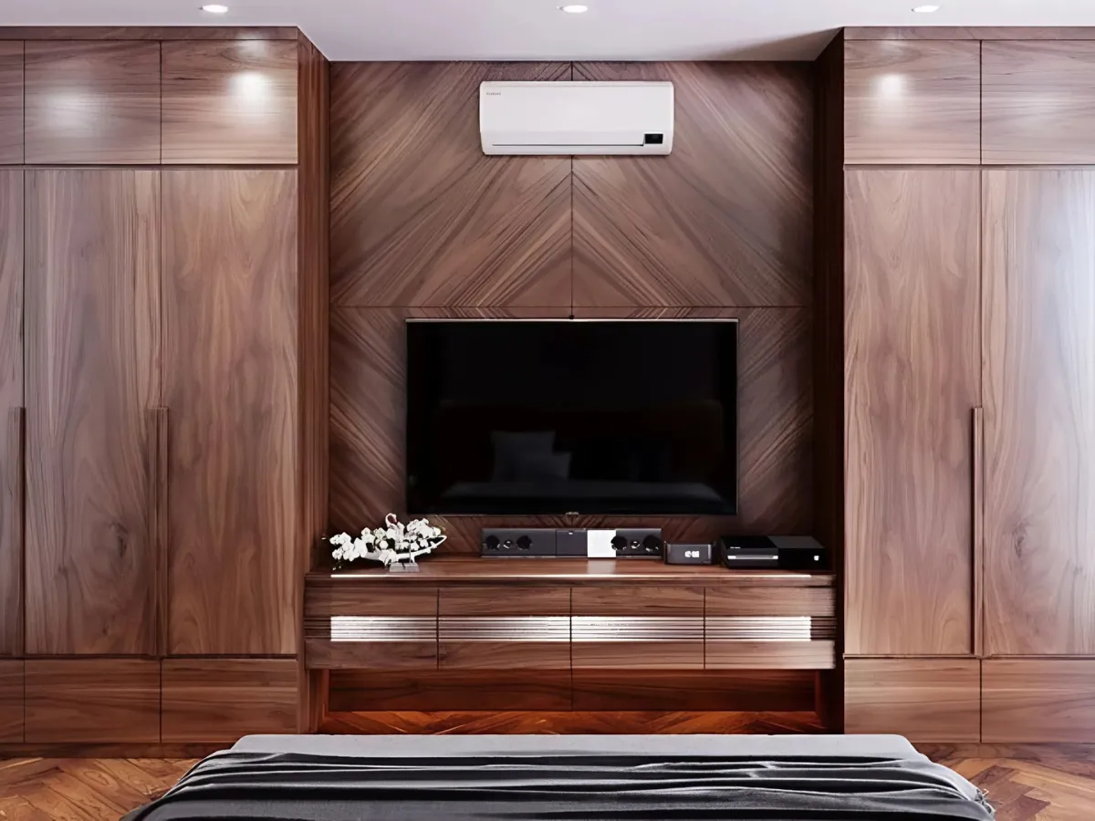 Hệ tủ quần áo kết hợp tivi trong phòng ngủ được làm từ gỗ óc chó (Nguồn: Sưu tầm)